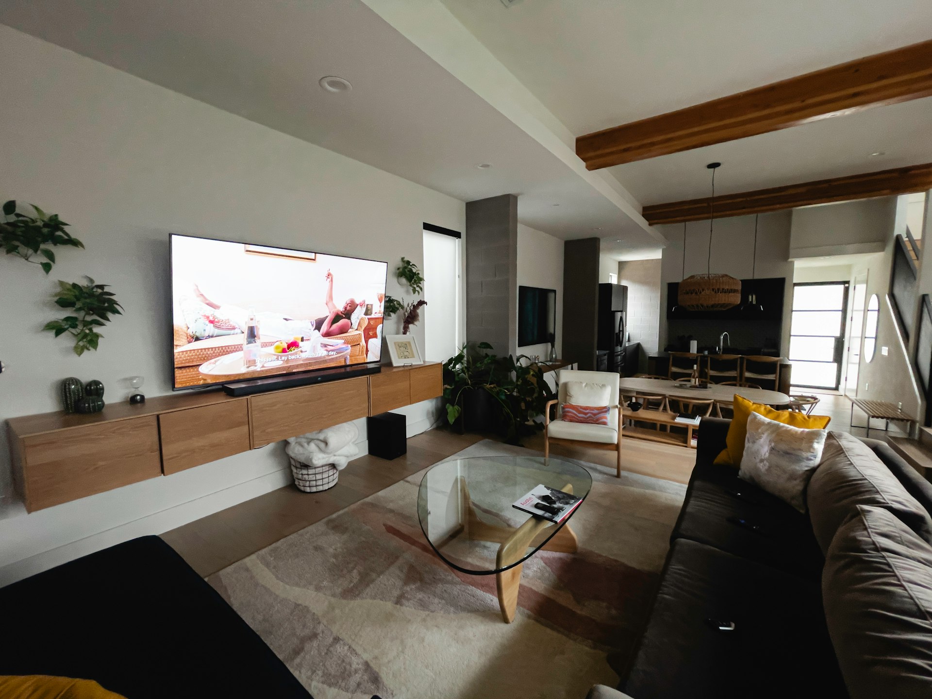 A living room filled with furniture and a flat screen TV